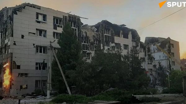 The aftermath of Ukraine's drone attack on a school and a dormitory in the Lugansk People's Republic - Sputnik International