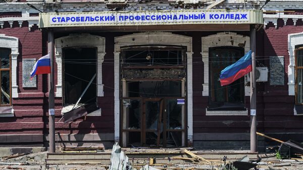 The aftermath of Ukraine's drone attack on a school and a dormitory in the Lugansk People's Republic - Sputnik International
