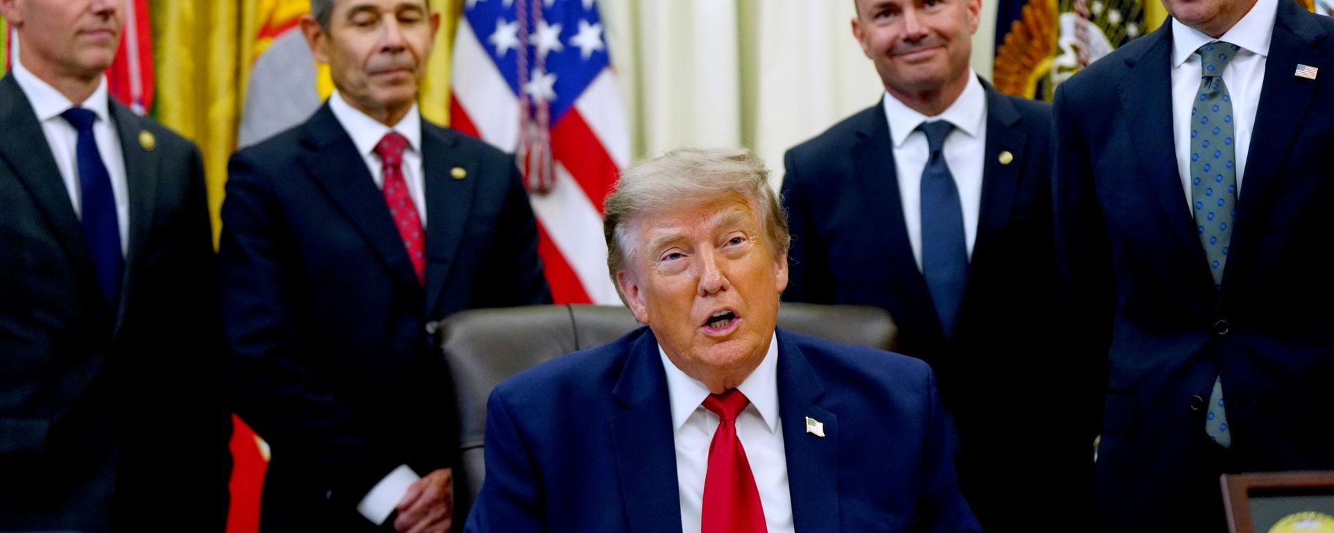 President Donald Trump speaks before signing executive orders modifying the Grand Staircase-Escalante National Monument and the Bears Ears National Monument in the Oval Office of the White House, Monday, July 13, 2026, in Washington - Sputnik International, 1920, 14.07.2026