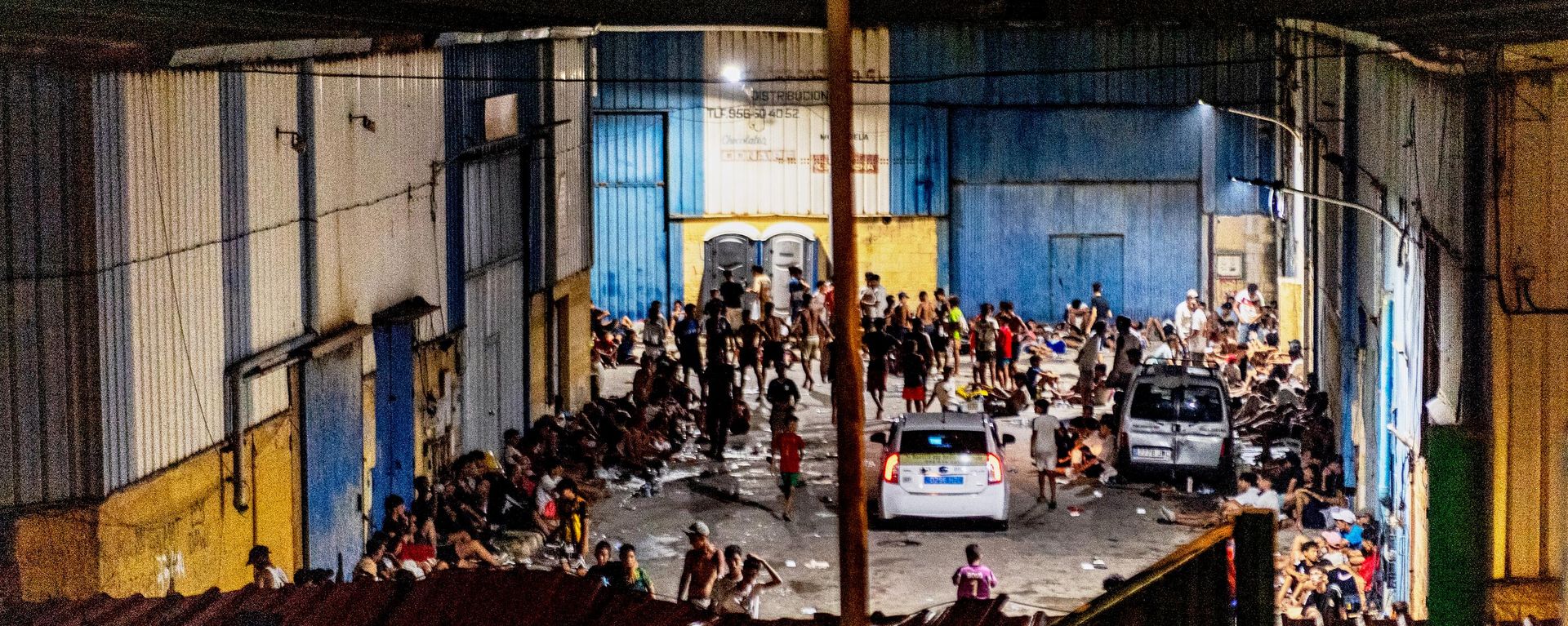 Migrants spend the night on the streets after crossing from Morocco into the Spanish enclave of Ceuta, Friday, July 31, 2026 Migrants spend the night on the streets after crossing from Morocco into the Spanish enclave of Ceuta, Friday, July 31, 2026 - Sputnik International, 1920, 31.07.2026