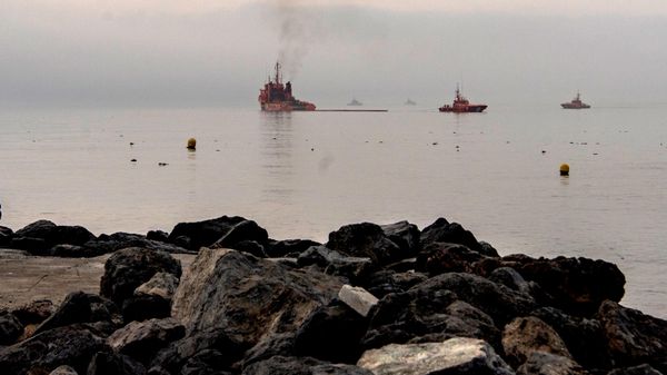 Civil Protection vessels assist in the installation of floating barriers off the coast of the Spanish enclave of Ceuta, Saturday, Aug. 1, 2026.  - Sputnik International