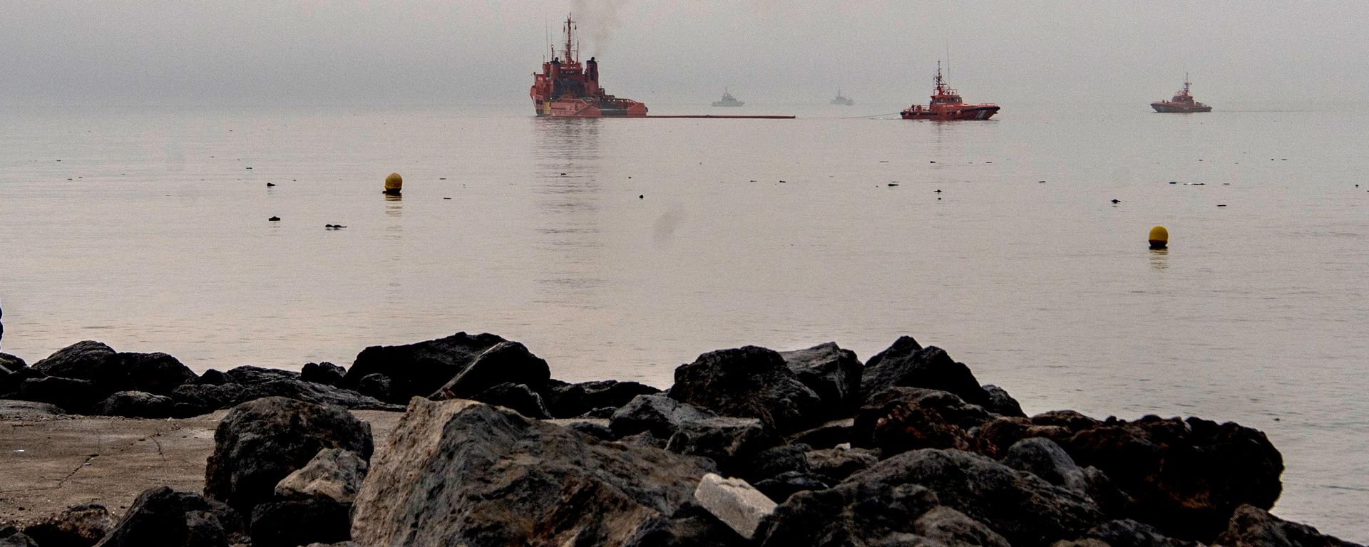 Civil Protection vessels assist in the installation of floating barriers off the coast of the Spanish enclave of Ceuta, Saturday, Aug. 1, 2026.  - Sputnik International, 1920, 01.08.2026
