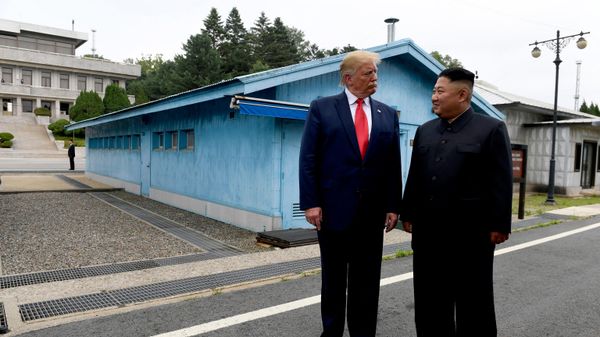 In this June 30, 2019, file photo, US President Donald Trump, left, meets with North Korean leader Kim Jong-un at the border village of Panmunjom in Demilitarized Zone, South Korea - Sputnik International