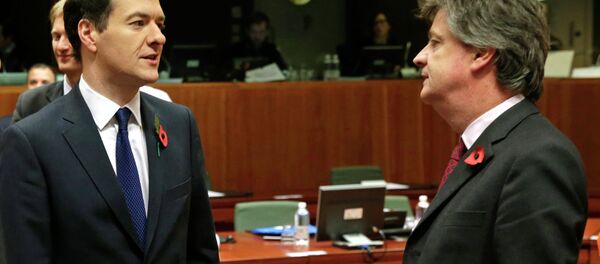 British Chancellor of the Exchequer George Osborne, left, talks with European Commissioner for Financial Stability and Financial Services Jonathan Hill British Chancellor of the Exchequer George Osborne, left, talks with European Commissioner for Financial Stability and Financial Services Jonathan Hill - Sputnik International