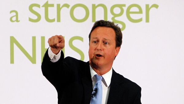 UK Prime Minister David Cameron gestures as he makes a speech about NHS reforms at University College Hospital in London, Tuesday, June, 7, 2011. - Sputnik International