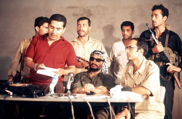Yasser Arafat delivering a press conference in 1970 during Black September. Arafat lead the Palestinian Liberation Organisation (PLO) in the civil war fought to determine control of Jordan - Sputnik International