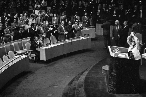 Yasser Arafat addresses the United Nations General Assembly in New York, Nov. 14, 1974. The empty seats in foreground, left, were left unoccupied by the Israeli delegation. - Sputnik International