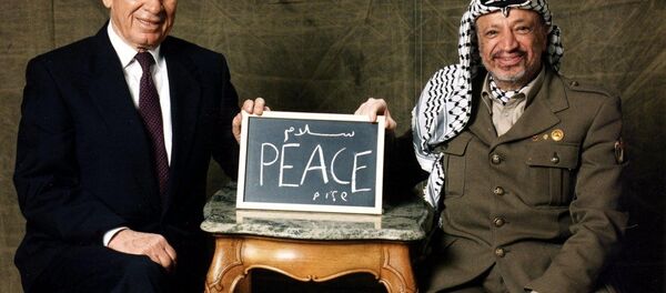 Arafat and Shimon Peres acknowledging winning the Nobel Peace Prize in 1994 for their efforts to create peace in the Middle East Arafat and Shimon Peres acknowledging winning the Nobel Peace Prize in 1994 for their efforts to create peace in the Middle East - Sputnik International