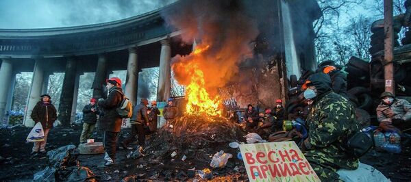 KIEV, UKRAINE - JANUARY 24: Barricade with the protesters at Hrushevskogo street on January 26, 2014 in Kiev, Ukraine. The anti-governmental protests turned into violent clashes during last week KIEV, UKRAINE - JANUARY 24: Barricade with the protesters at Hrushevskogo street on January 26, 2014 in Kiev, Ukraine. The anti-governmental protests turned into violent clashes during last week - Sputnik International