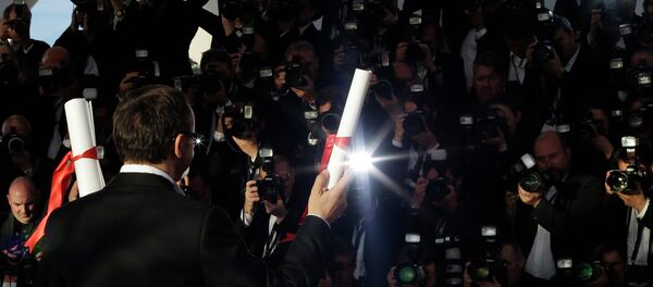 Director Andrey Zvyagintsev poses after winning the Best Screenplay award for the film Leviathan during a photo call following the awards ceremony at the 67th international film festival, Cannes Director Andrey Zvyagintsev poses after winning the Best Screenplay award for the film Leviathan during a photo call following the awards ceremony at the 67th international film festival, Cannes - Sputnik International