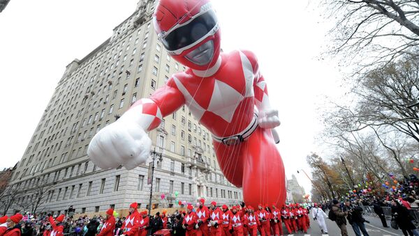 The Red Mighty Morphin Power Ranger makes his legendary debut at the 88th annual Macy's Thanksgiving Day Parade, Thursday, Nov. 27, 2014, in New York. - Sputnik International
