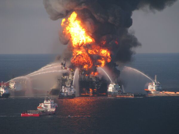 Fire boat response crews battle the blazing remnants of the off shore oil rig Deepwater Horizon on April 21, 2010. - Sputnik International