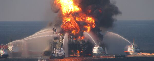 Fire boat response crews battle the blazing remnants of the off shore oil rig Deepwater Horizon on April 21, 2010. Fire boat response crews battle the blazing remnants of the off shore oil rig Deepwater Horizon on April 21, 2010. - Sputnik International