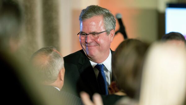 Former Florida Gov. Jeb Bush talks to supporters after speaking at the U.S. Cuba Democracy PAC's 11th Annual Luncheon in Coral Gables, Fla. - Sputnik International