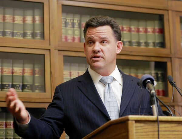 Nebraska Attorney General Jon Bruning speaks at a news conference in Lincoln, Neb. on Thursday, Dec. 18, 2014 annoucing that he and Oklahoma Attorney General Scott Pruitt are filing a lawsuit in the U.S. Supreme Court seeking a declaration that Colorado's legalization of marijuana violates the U.S. Constitution.  - Sputnik International