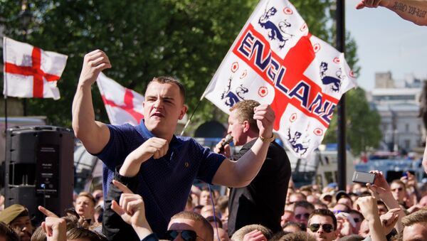 A supporter of the far-right English Defence League (EDL) gestures near Downing Street in central London - Sputnik International