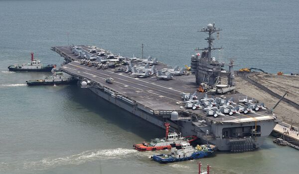 The US nuclear powered aircraft carrier USS George Washington arrives at the southeastern port city of Busan on July 11, 2014 The US nuclear powered aircraft carrier USS George Washington arrives at the southeastern port city of Busan on July 11, 2014 - Sputnik International