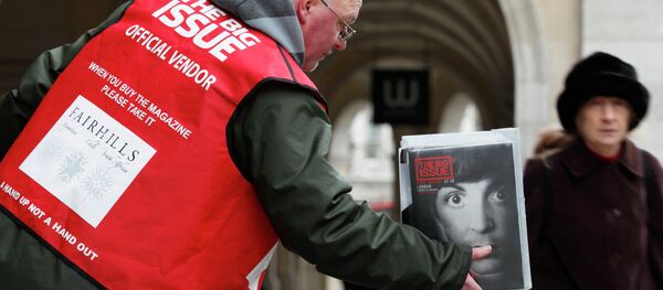 Big Issue seller in the street near Charing Cross in central London Big Issue seller in the street near Charing Cross in central London - Sputnik International