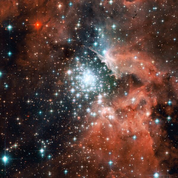 Extreme star cluster bursts into life in new Hubble image - Sputnik International