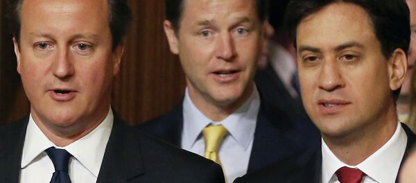 British Prime Minister David Cameron, left, Deputy Prime Minister and leader of the Liberal Democrats Nick Clegg, centre, and Leader of the Labour Party Ed Miliband. British Prime Minister David Cameron, left, Deputy Prime Minister and leader of the Liberal Democrats Nick Clegg, centre, and Leader of the Labour Party Ed Miliband. - Sputnik International