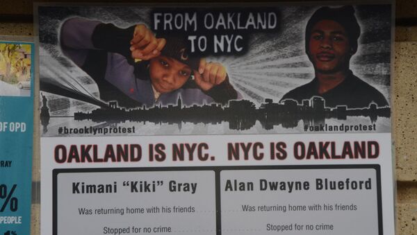 A poster calls for justice for Kimani Gray, a 16-year-old killed by police. - Sputnik International
