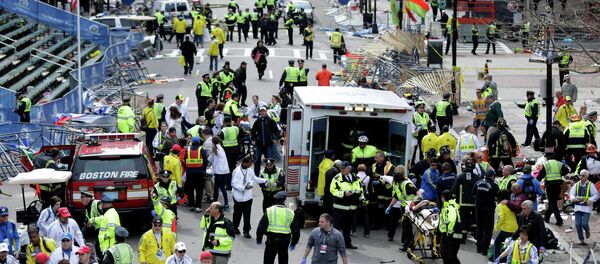 Medical workers aid injured people at the finish line of the 2013 Boston Marathon following an explosion. Medical workers aid injured people at the finish line of the 2013 Boston Marathon following an explosion. - Sputnik International