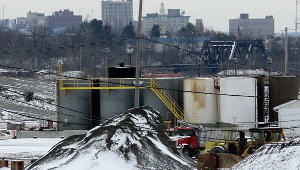 A brine injection well owned by Northstar Disposal Services LLC is seen in Youngstown, Ohio, with the skyline of Youngstown in the distance. A dozen earthquakes in northeastern Ohio were almost certainly induced by injection of gas-drilling wastewater into the earth, state regulators said Friday, March 9, 2012 as they announced a series of tough new rules for drillers. Fracking was halted in Ohio after two major earthquakes were felt in Youngstown in March, 2014. - Sputnik International
