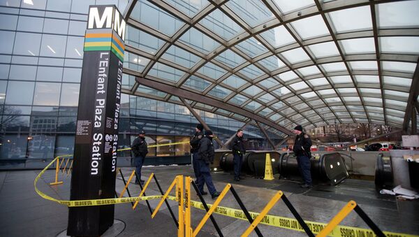 Metro Transit Police officers, secure the entrance to L’Enfant Plaza Station in Washington, Monday, Jan. 12. - Sputnik International