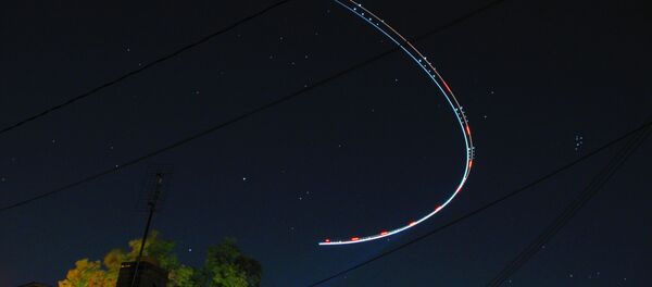 UFO hunters claim that NASA has been interrupting its live feed whenever a UFO is near the International Space Station. - Sputnik International