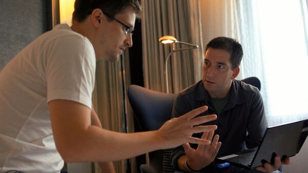 In this still from the movie Citizenfour, NSA whistleblower Edward Snowden, left, speaks with journalist Glenn Greenwald. The Oscar-nominated film intimately captures Snowden during his leak of NSA documents. - Sputnik International
