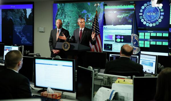 President Obama next to Secretary of Homeland Security Jeh Johnson at the NCCIC. President Obama next to Secretary of Homeland Security Jeh Johnson at the NCCIC. - Sputnik International