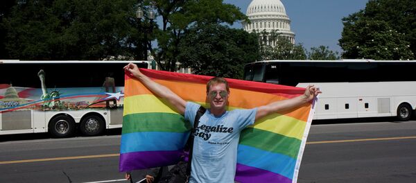 Gay rights activist celebrates SCOTUS victory in June, 2013. Gay rights activist celebrates SCOTUS victory in June, 2013. - Sputnik International