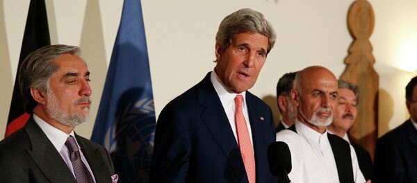 US Secretary of State John Kerry, centre, announces a deal with Afghanistan's presidential candidates Abdulah Abdullah, left, and Ashraf Ghani US Secretary of State John Kerry, centre, announces a deal with Afghanistan's presidential candidates Abdulah Abdullah, left, and Ashraf Ghani - Sputnik International