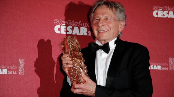 In this Feb. 28, 2014 file photo, Polish-French film director Roman Polanski holds his best director award during the 39th French Cesar Awards Ceremony in Paris.  - Sputnik International