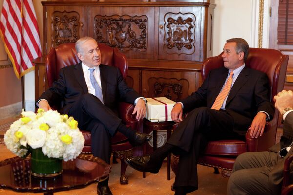 In response to President Barack Obama's promise to veto any sanctions against Iran, House Speaker John Boehner, right, invited Israeli Prime Minister Benjamin Netanyahu to address a joint session of Congress next month. In response to President Barack Obama's promise to veto any sanctions against Iran, House Speaker John Boehner, right, invited Israeli Prime Minister Benjamin Netanyahu to address a joint session of Congress next month. - Sputnik International