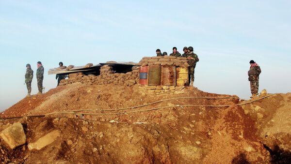 Kurdish peshmerga forces prepare for battle against the Islamic State group, near the Mosul Dam, in Iraq. - Sputnik International