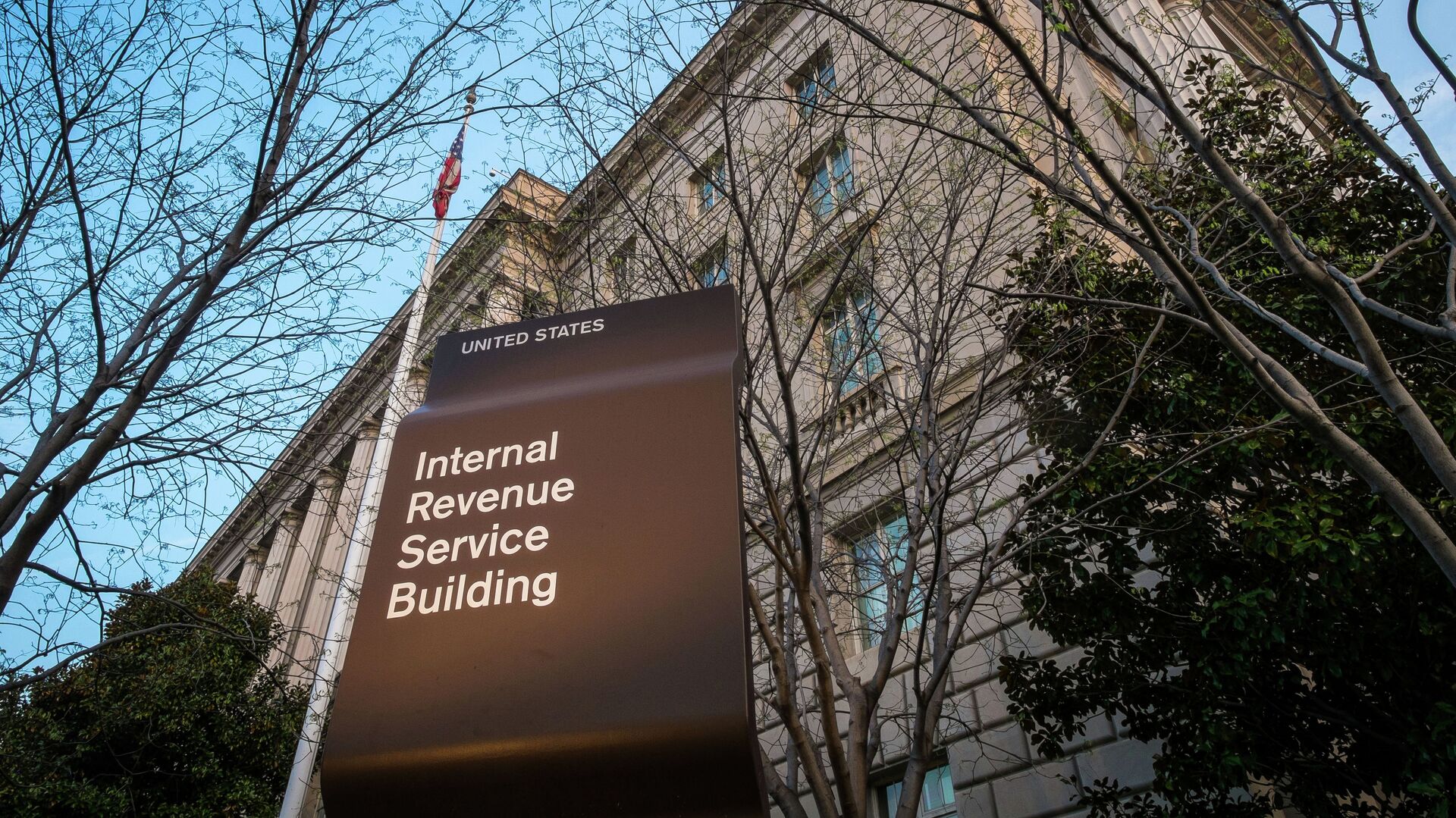 In this April 13, 2014 file photo, the Internal Revenue Service Headquarters (IRS) building is seen in Washington. The IRS is cutting taxpayer services to historically low levels just as President Barack Obama's health law will make filing a federal tax return more complicated for millions of families.  - Sputnik International, 1920, 29.01.2022