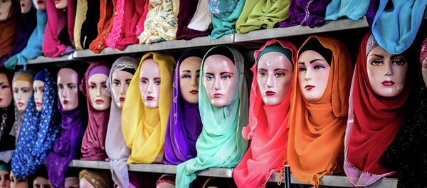 Muslim headscarfs and hijabs in a range of colors are for sale at an Indonesian market Muslim headscarfs and hijabs in a range of colors are for sale at an Indonesian market - Sputnik International