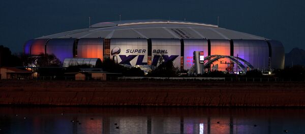 The Super Bowl XLIX logo is displayed on the University of Phoenix Stadium, Tuesday, Jan. 27, 2015, in Glendale, Ariz. The New England Patriots face the Seattle Seahawks in Super Bowl XLIX on Sunday, Feb. 1, in Glendale. - Sputnik International