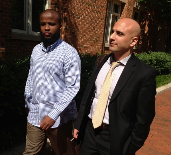 Gulet Mohamed, left, leaves the federal court in Alexandria, Va., with his attorney, Gadeir Abbas. - Sputnik International