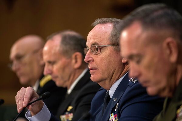 Air Force Chief of Staff Gen. Mark Welsh III, second from right, responds to questions from Senate Armed Services Committee member Sen. Kelly Ayotte, R-N.H., as he testifies on Capitol Hill in Washington, Wednesday, Jan. 28, 2015, before the committee's hearing on the impact of the Budget Control Act of 2011 and sequestration on national security. From left are, Army Chief of Staff Gen. Raymond Odierno, Chief of Naval Operations Adm. Jonathan Greenert, Welsh, and Marine Corps Commandant Joseph Dunford, Jr. Air Force Chief of Staff Gen. Mark Welsh III, second from right, responds to questions from Senate Armed Services Committee member Sen. Kelly Ayotte, R-N.H., as he testifies on Capitol Hill in Washington, Wednesday, Jan. 28, 2015, before the committee's hearing on the impact of the Budget Control Act of 2011 and sequestration on national security. From left are, Army Chief of Staff Gen. Raymond Odierno, Chief of Naval Operations Adm. Jonathan Greenert, Welsh, and Marine Corps Commandant Joseph Dunford, Jr. - Sputnik International