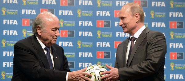 Russia's President Vladimir Putin (R) and FIFA President Joseph Blatter - Sputnik International