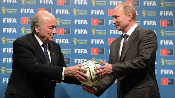 Russia's President Vladimir Putin (R) and FIFA President Joseph Blatter - Sputnik International