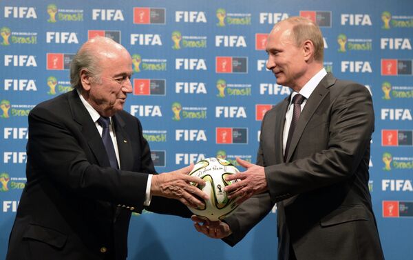 Russia's President Vladimir Putin (R) and FIFA President Joseph Blatter - Sputnik International