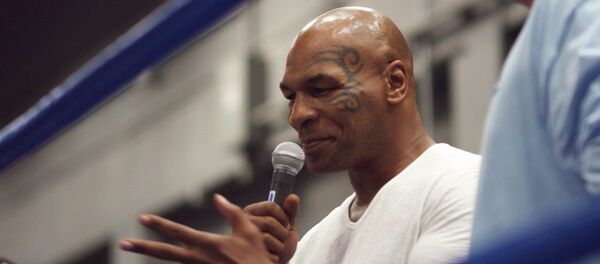 A Russian-language version of the retired US boxer Mike Tyson’s biographical book “Tyson: Undisputed Truth” has been presented in one the capital’s fitness clubs. Though not present himself, Tyson sent a video address to the future readers. A Russian-language version of the retired US boxer Mike Tyson’s biographical book “Tyson: Undisputed Truth” has been presented in one the capital’s fitness clubs. Though not present himself, Tyson sent a video address to the future readers. - Sputnik International