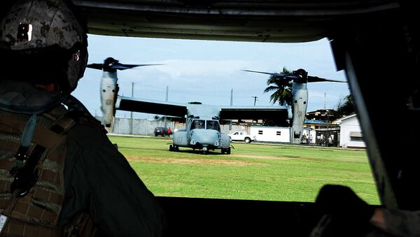 View from the rear ramp of a US Marine Corps MV-22B Osprey before it takes off from Barclay Training Center in Monrovia, Liberia - Sputnik International