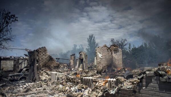 A house destroyed in the Ukrainian armed forces' air attack in the village of Luganskaya. - Sputnik International
