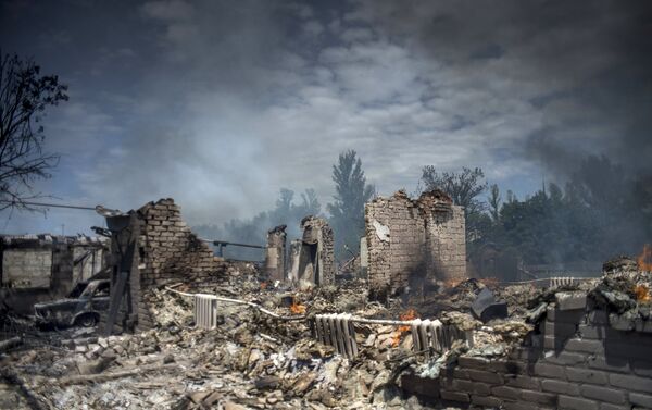 A house destroyed in the Ukrainian armed forces' air attack on the village of Luganskaya - Sputnik International