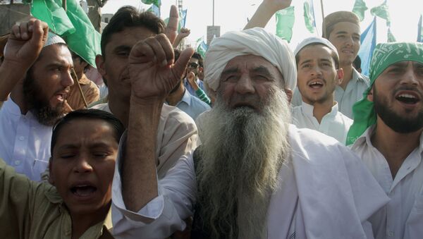 Supporters of Pakistan's religious party Jamaat-e-Islami rally - Sputnik International