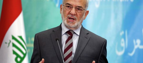 Iraqi Foreign Minister Ibrahim al-Jaafari (R) speaks during a news conference with Australian Foreign Minister Julie Bishop in Baghdad, October 18, 2014 - Sputnik International